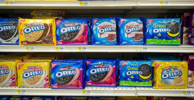 Boxes of Mondelez International's Oreo Cookies in multiple yummy flavors on a supermarket shelf in New York on Tuesday, March 9, 2015. Pershing Square Capital Management has invested $5.5 billion in the company, 7.5 percent stake. Mondelez International owns the Oreo, Cadbury and Trident brands. (© Richard B. Levine)