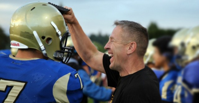 Bremerton assistant football coach Joe Kennedy with the team before the game at Memorial Stadium on Friday.LARRY STEAGALL / KITSAP SUN
